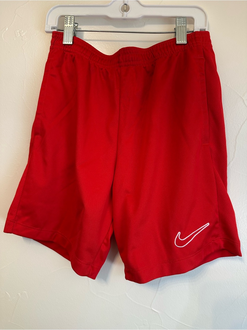 Nike Red Boys’ Athletic Mesh Shorts with White Swoosh